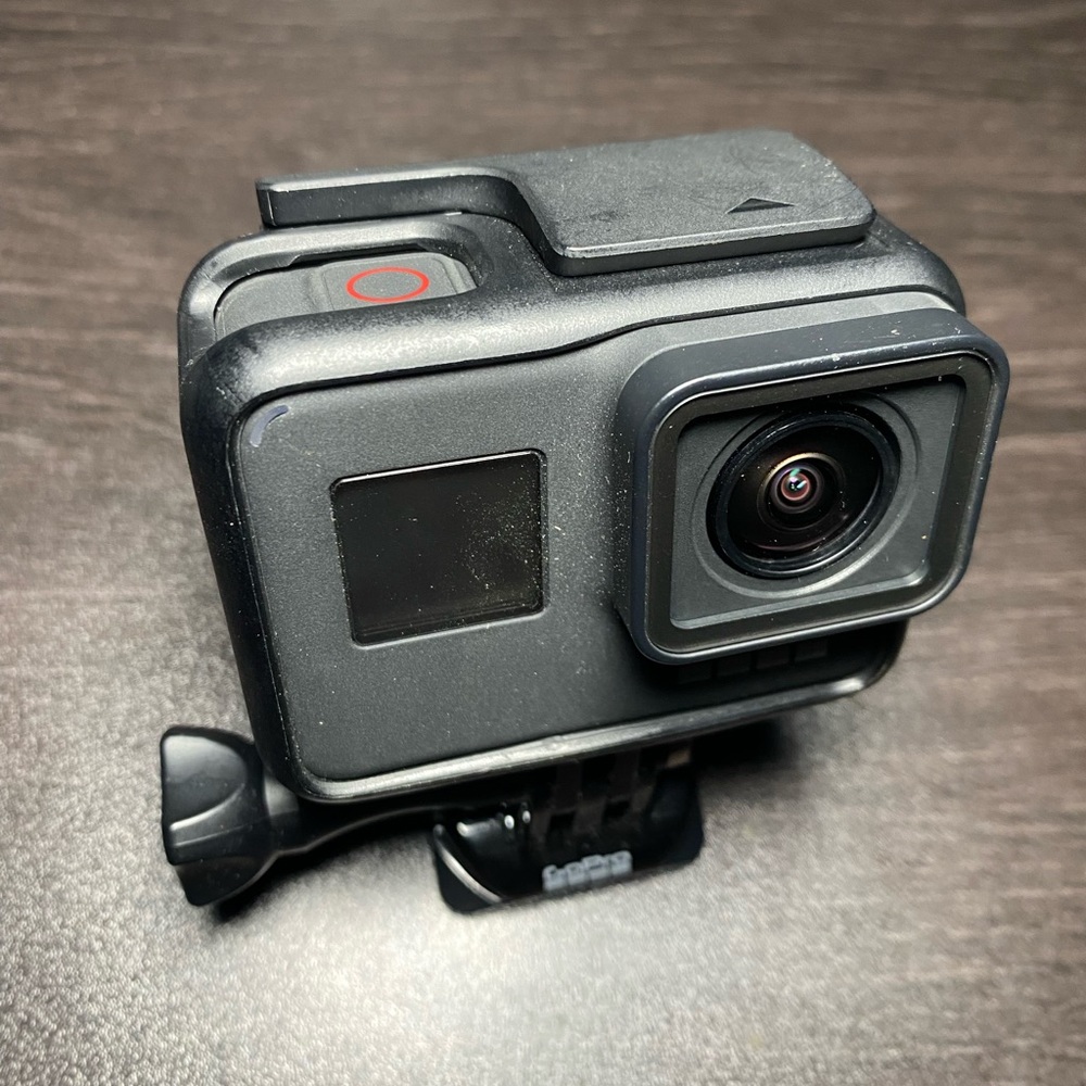 Used(like New) GoPro Hero 7 Black. Includes 3 total batteries, 32GB card, etc!